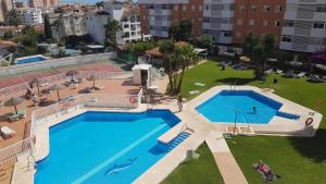 The swimming pool at or close to Welcoming studio in Torremolinos 45 m² with shared pool