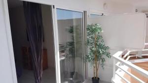 A balcony or terrace at Welcoming studio in Torremolinos 45 m² with shared pool