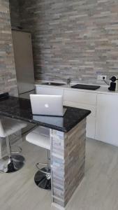 A kitchen or kitchenette at Welcoming studio in Torremolinos 45 m² with shared pool