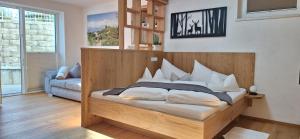 Posteľ alebo postele v izbe v ubytovaní Appartements Haus Olympia