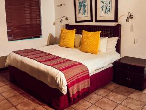 Postel nebo postele na pokoji v ubytování Kruger Island Resort + 27 fotografií