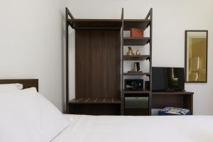 Postel nebo postele na pokoji v ubytování Villa Aurora Rooms