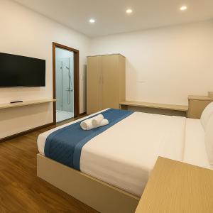 Voodi või voodid majutusasutuse Tuan Thuy Hotel toas