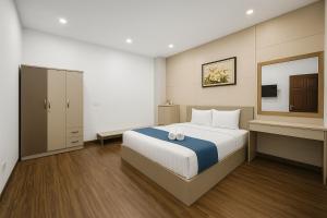 Voodi või voodid majutusasutuse Tuan Thuy Hotel toas