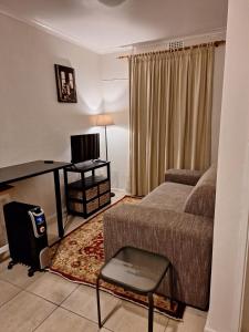 Et tv og/eller underholdning på Constantia Garden Cottage