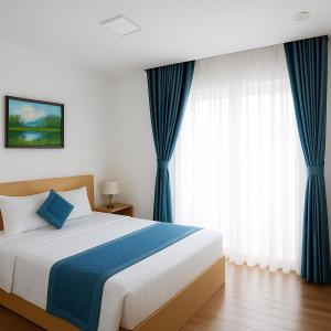 Voodi või voodid majutusasutuse Tuan Thuy Hotel toas