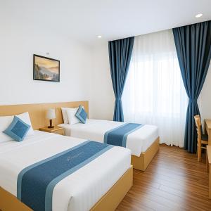 Voodi või voodid majutusasutuse Tuan Thuy Hotel toas