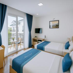 Voodi või voodid majutusasutuse Tuan Thuy Hotel toas +24 fotot