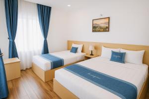 Voodi või voodid majutusasutuse Tuan Thuy Hotel toas