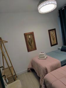 Posteľ alebo postele v izbe v ubytovaní Casa Abuela