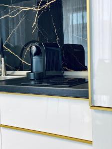 Køkken eller tekøkken på Onix Aparthotel SD Luxury Sea View 42