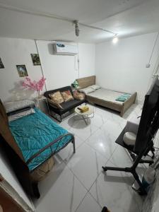 Un lugar para sentarse en Js studio type 4pax