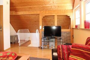 Et tv og/eller underholdning på Ferienwohnung Greetje