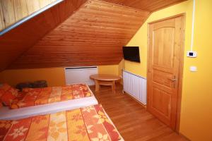 Postel nebo postele na pokoji v ubytování Bo-Ni Vendégház