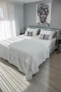 Postel nebo postele na pokoji v ubytování Dachterrassen Wohnung Teneriffa