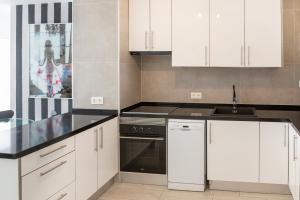 Kuchyň nebo kuchyňský kout v ubytování Dachterrassen Wohnung Teneriffa