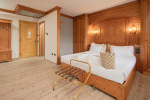 Postel nebo postele na pokoji v ubytování Gaarten Hotel Benessere Spa by Kleos Group Collection