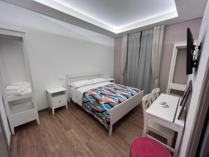 Postel nebo postele na pokoji v ubytování Mardò