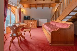 TV a/nebo společenská místnost v ubytování Gaarten Hotel Benessere Spa by Kleos Group Collection