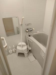Ένα μπάνιο στο apartment hotel myu 郡山 +5 φωτογραφίες
