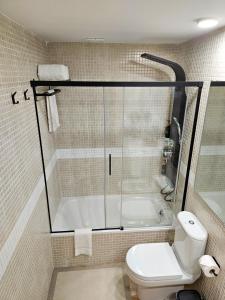 Et badeværelse på At The Beach Fisterra + 22 billeder