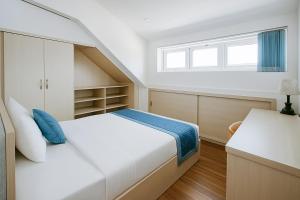 Voodi või voodid majutusasutuse Tuan Thuy Hotel toas
