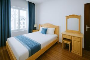 Voodi või voodid majutusasutuse Tuan Thuy Hotel toas