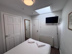 TV a/nebo společenská místnost v ubytování Park View Rooms + 28 fotografií