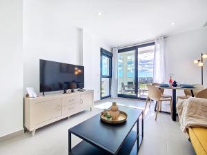 TV a/nebo společenská místnost v ubytování Santa Rosalia Lake & Life Resort - 5510