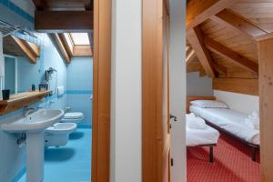 Koupelna v ubytování Gaarten Hotel Benessere Spa by Kleos Group Collection
