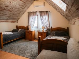 Postel nebo postele na pokoji v ubytování U Krba