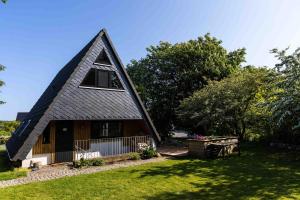 Zahrada ubytování Min Hus - Ferienhaus a d Schlei + 8 fotografií