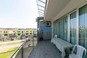 Balkón nebo terasa v ubytování Condominio Mimose