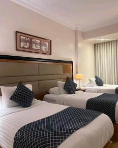 Postel nebo postele na pokoji v ubytování King pyramids view