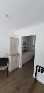 Η κουζίνα ή μικρή κουζίνα στο Cosy Hutch +6 φωτογραφίες
