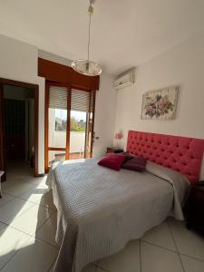 Postel nebo postele na pokoji v ubytování B&B Casa di Donna