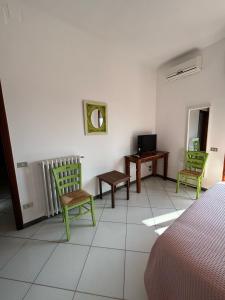 TV a/nebo společenská místnost v ubytování B&B Casa di Donna