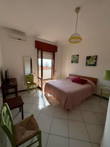 Postel nebo postele na pokoji v ubytování B&B Casa di Donna