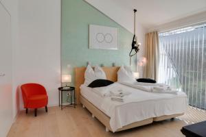 Ένα ή περισσότερα κρεβάτια σε δωμάτιο στο Architekten Haus 120 m2 in der Wetterau