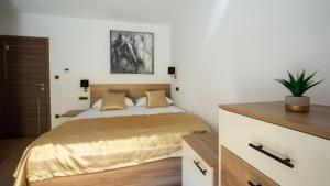 Postel nebo postele na pokoji v ubytování Rooms & Apartments Toni