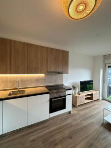 Kuchyň nebo kuchyňský kout v ubytování Apartamento Maralta Luanco - VUT 6939 AS