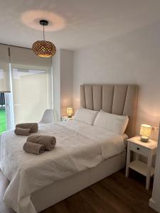 Postel nebo postele na pokoji v ubytování Apartamento Maralta Luanco - VUT 6939 AS