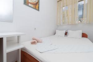 Posteľ alebo postele v izbe v ubytovaní Apartment JoviZ