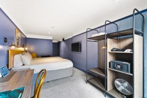Postel nebo postele na pokoji v ubytování Ropewalks Hotel