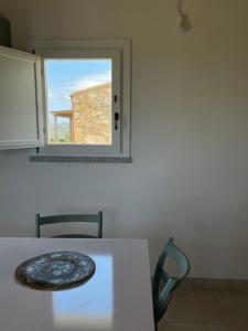 Fotografie z fotogalerie ubytování Isola Rossa Appartamenti Paduledda v destinaci Isola Rossa