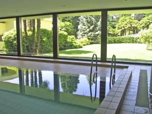 Bazén v ubytování Residenza Ascomonte, Parterre, App 30 by HolAp SA nebo v jeho okolí