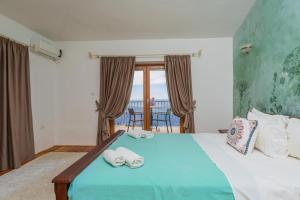 Olive Resort & Villas客房内的一张或多张床位