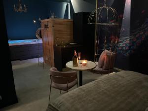 Postel nebo postele na pokoji v ubytování Add'Or, Suite et Spa