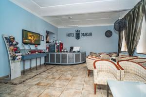 TV a/nebo společenská místnost v ubytování Hotel Otakar