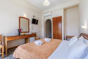 Afbeelding uit fotogalerij van Lemonis Rooms in Skopelos Town